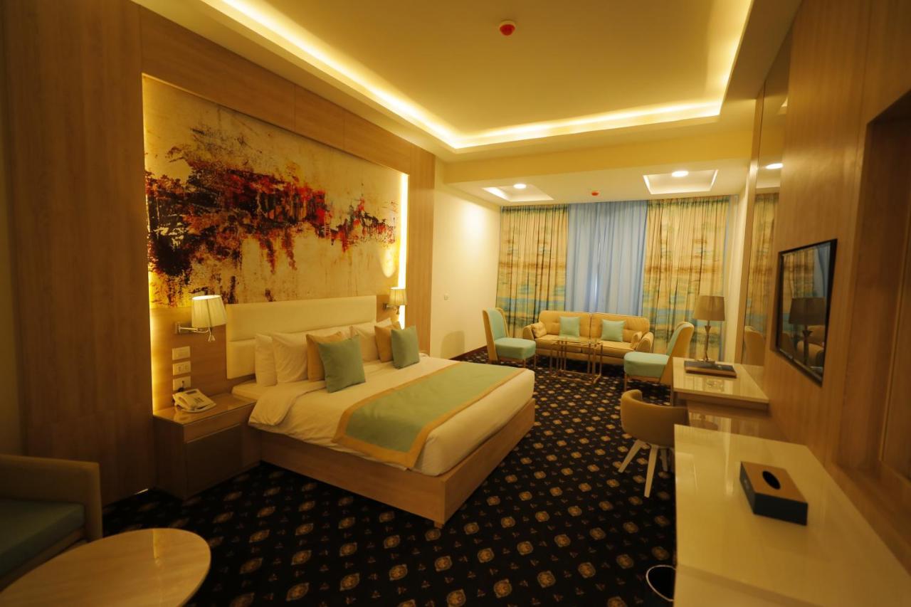 Tolip Gardens Hotel Cairo Exterior photo A room at the hotel